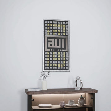 Silver 99 Names of Allah Kufic wall art, front view above a wooden console with a shelf