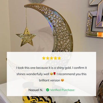 Shiny Gold crescent and star decor behind a five-star customer review about its shiny gold finish