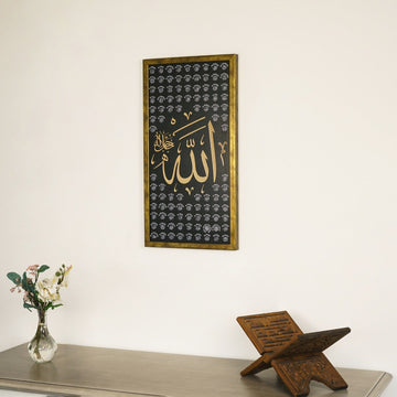 Gold Asma ul Husna Thuluth panel above a console with a Quran stand