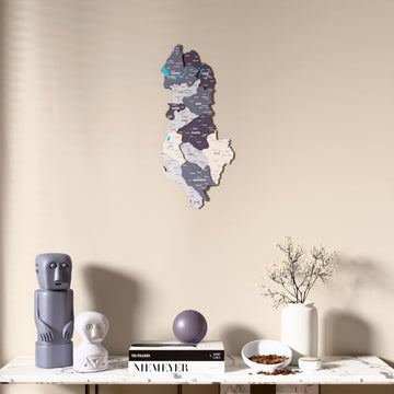 Nimbus Albania wooden wall map above a marble console, front view