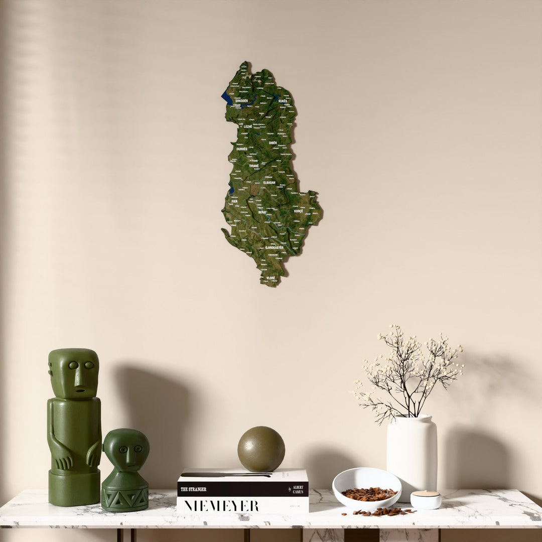 Satellite Albania wooden wall map above a marble console, front view