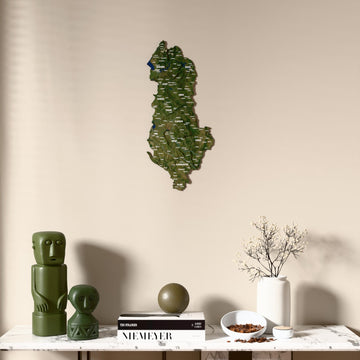 Satellite Albania wooden wall map above a marble console, front view