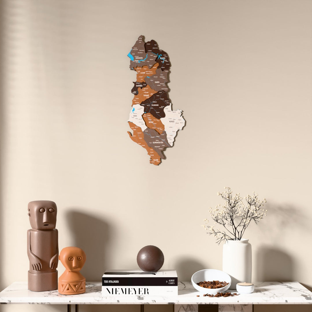 Soil Albania wooden wall map above a marble console, front view