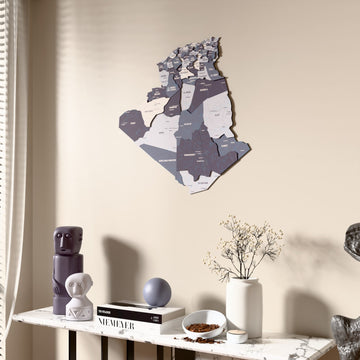 Nimbus Algeria wooden wall map beside a sheer curtain, angled view