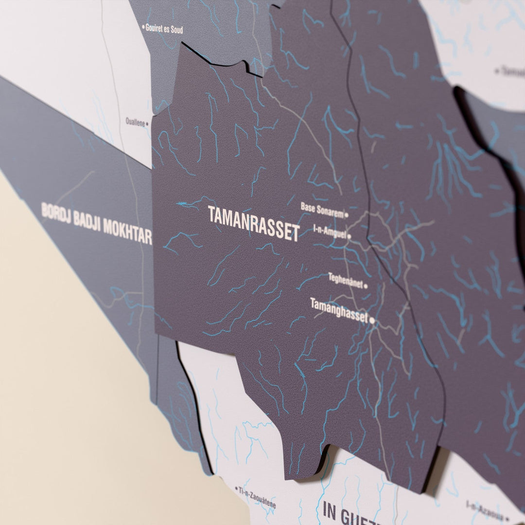 Close-up of the Nimbus Algeria wooden wall map with layered regions and printed names