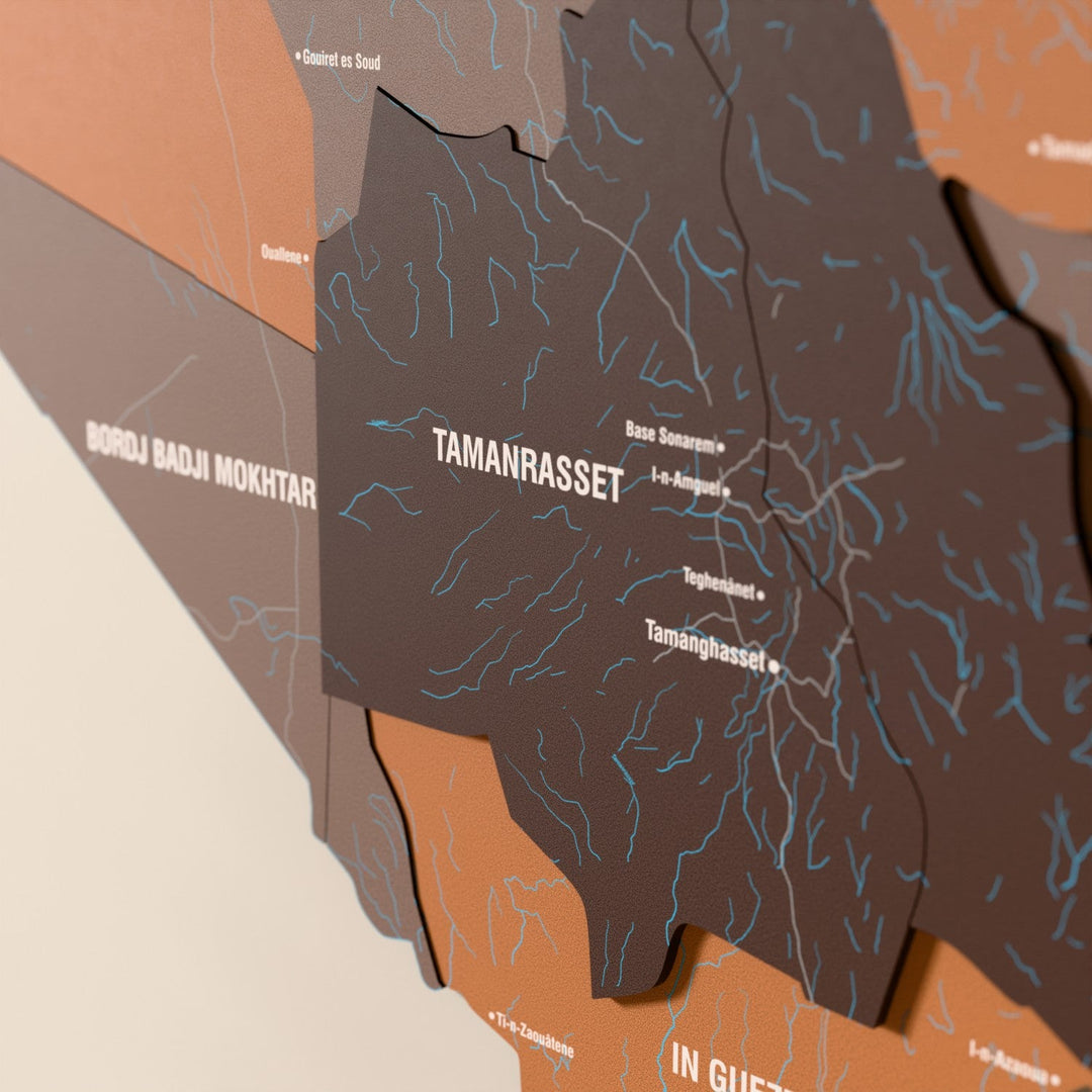 Close-up of the Soil Algeria wooden wall map with layered regions and printed names