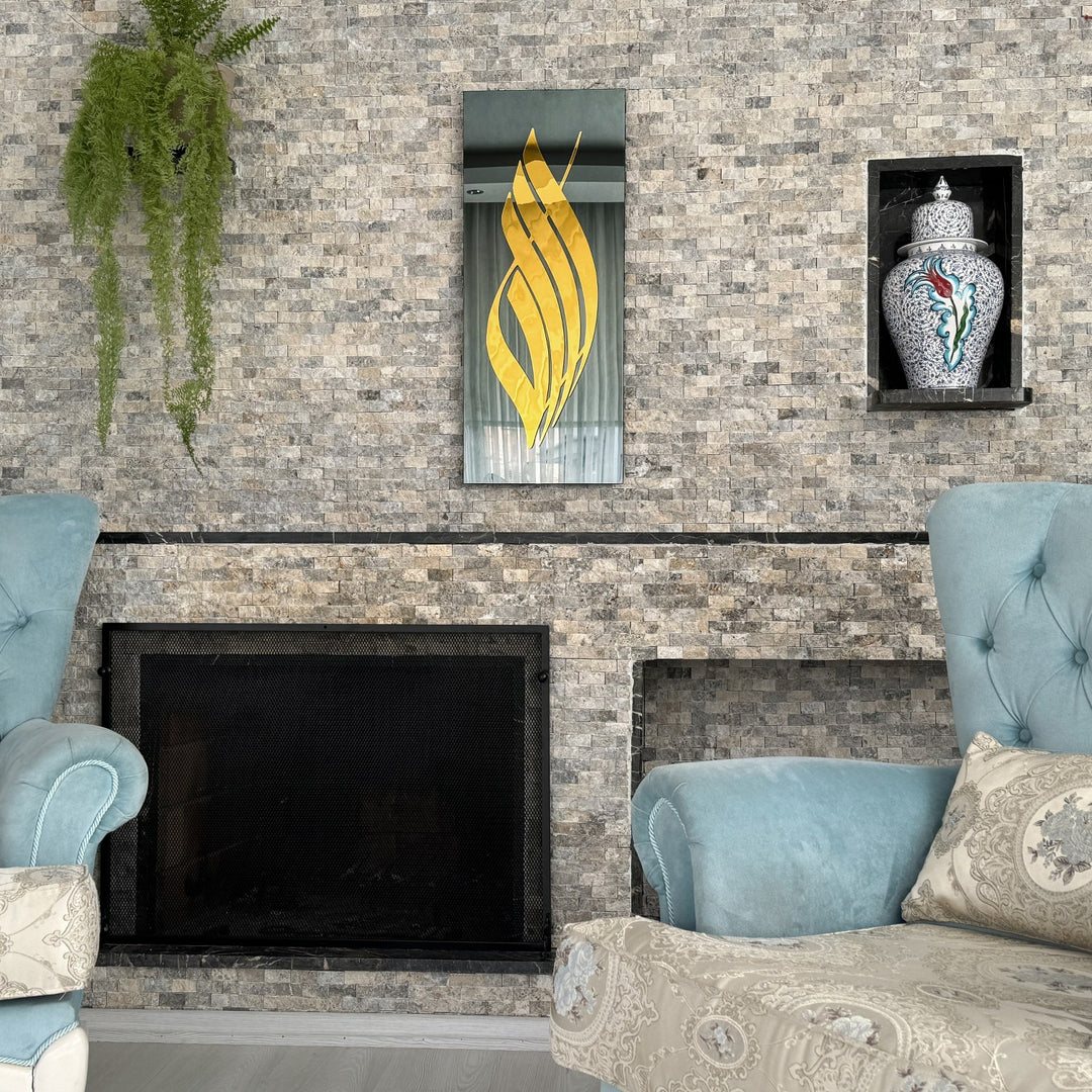 Gold Acrylic Allah calligraphy on black tempered glass hung above a stone fireplace, wide room view