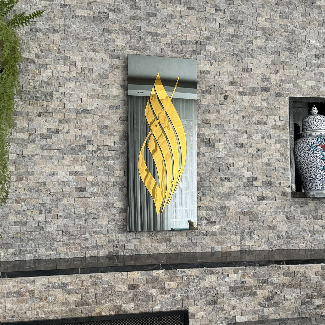 Gold Acrylic Allah calligraphy on black tempered glass, straight-on view on a stone wall