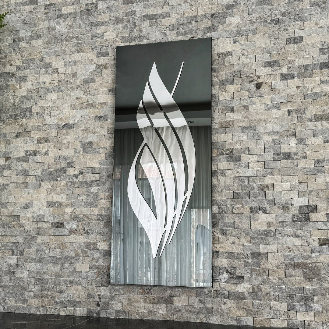Silver Acrylic Allah calligraphy on black tempered glass, angled view showing the reflective glass
