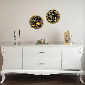 Gold Acrylic Allah and Mohammad circle wall art pair hung above a white sideboard with candlesticks
