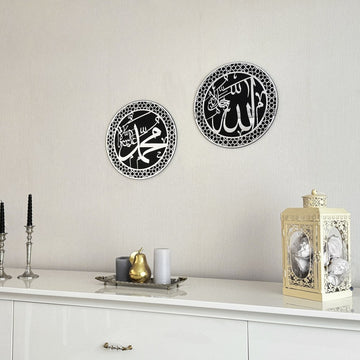 Silver Acrylic Allah and Mohammad circle wall art pair, angled view above a white sideboard