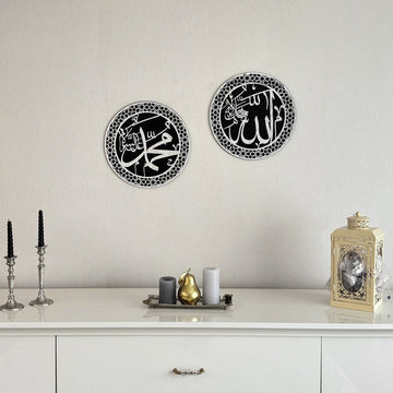 Silver Acrylic Allah and Mohammad circle wall art pair, closer view above a white sideboard