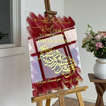 Glass Nikkah wedding sign with gold Surah Ar-Rum verse calligraphy on red, window reflections on the glass