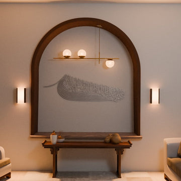 Silver ship-shaped Auzu Basmala and Dua al-Fath metal wall art in an arched wall niche above a console