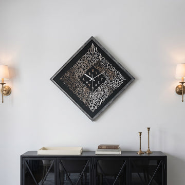 Ayatul Kursi framed diamond Islamic wall clock with silver acrylic calligraphy above a black console