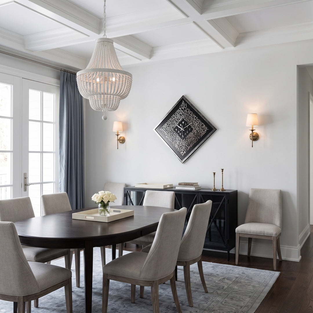 Diamond-hung silver Ayatul Kursi Islamic wall clock above a dining table