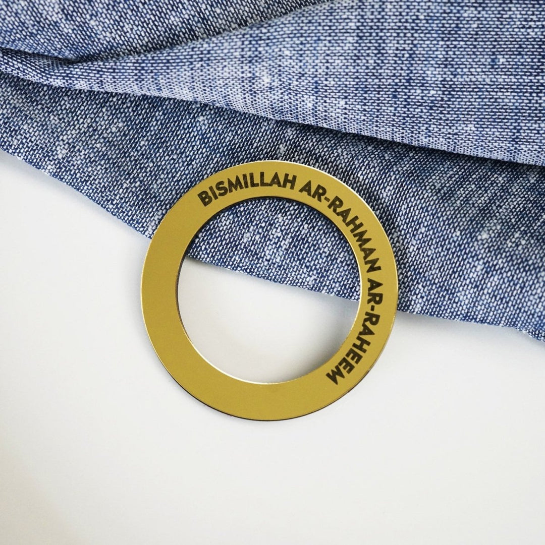 Bismillah Ar-Rahman Ar-Raheem circular napkin holder on a set table