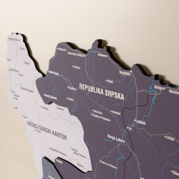 Close-up of the Nimbus Bosnia and Herzegovina wooden wall map with layered regions and printed names