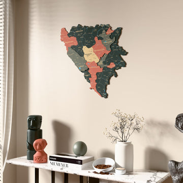 Sage Bosnia and Herzegovina wooden wall map beside a sheer curtain, angled view