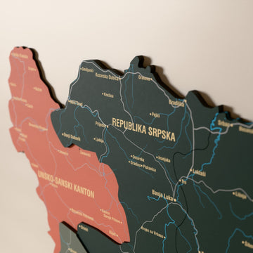 Close-up of the Sage Bosnia and Herzegovina wooden wall map with layered regions and printed names