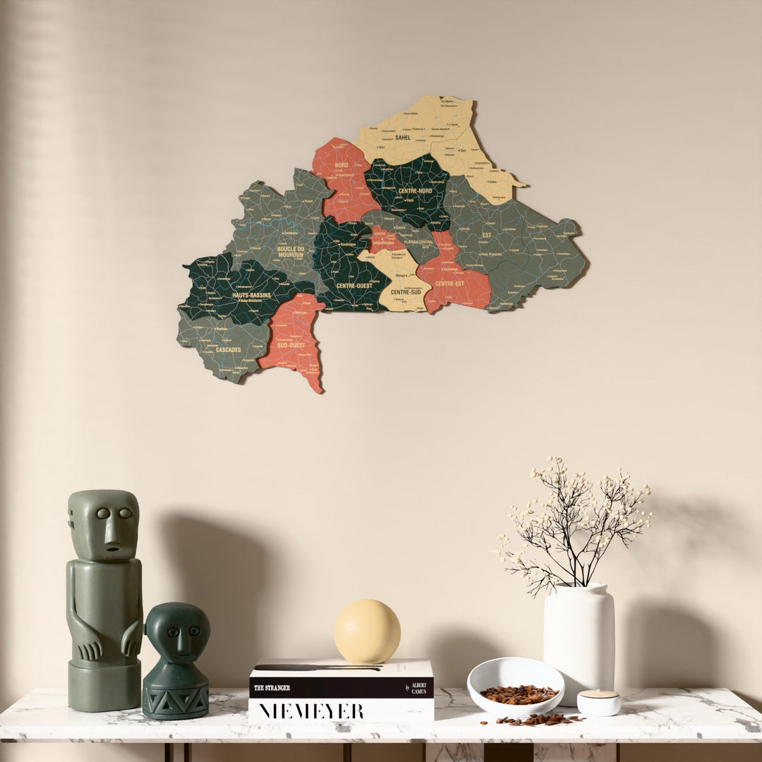 Sage Burkina Faso wooden wall map above a marble console, front view