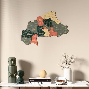 Sage Burkina Faso wooden wall map above a marble console, front view