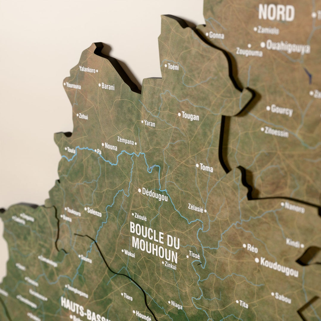 Close-up of the Satellite Burkina Faso wooden wall map with layered regions and printed names