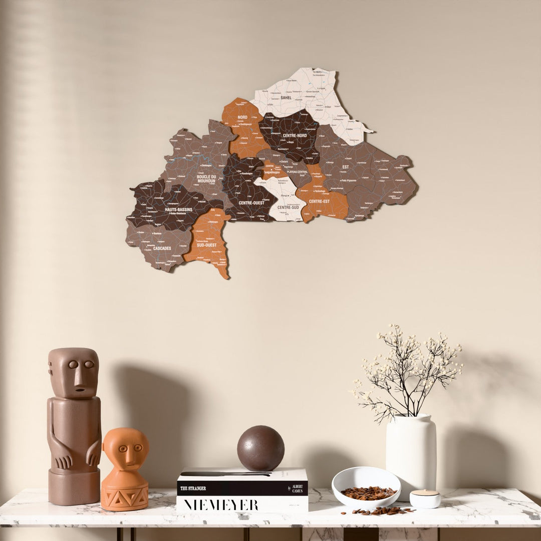 Soil Burkina Faso wooden wall map above a marble console, front view