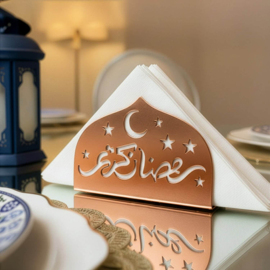 Ramadan Kareem metal napkin holder in copper on a set table