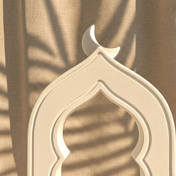 Close-up of the mihrab stone arch's crescent moon and layered inner arch edge