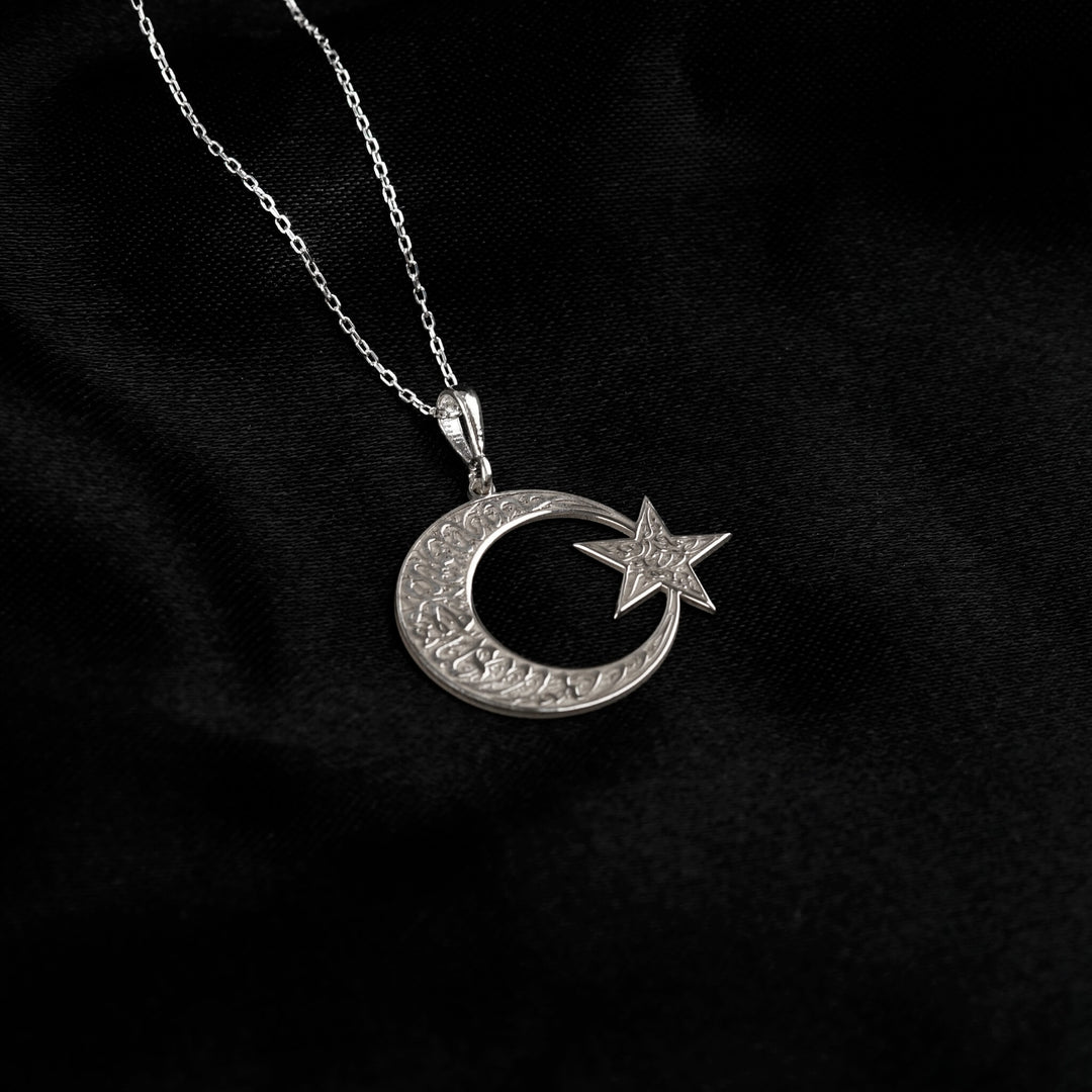 Kalima Tawhid crescent and star necklace, polished silver