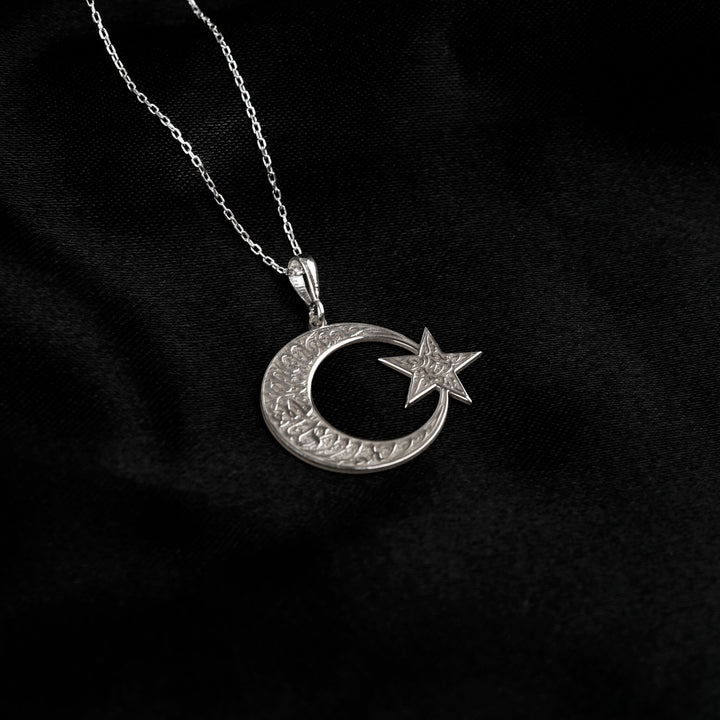 Kalima Tawhid crescent and star necklace, polished silver