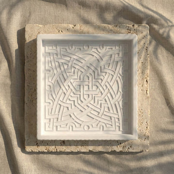 Relief géométrique de l'Alhambra en pierre – Motif d'étoile curviligne