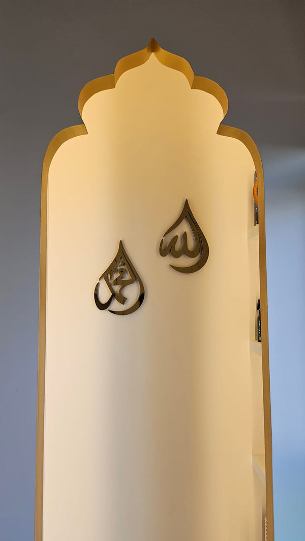 Customer photo of gold Allah and Muhammad drop-shaped wall art in an arched niche