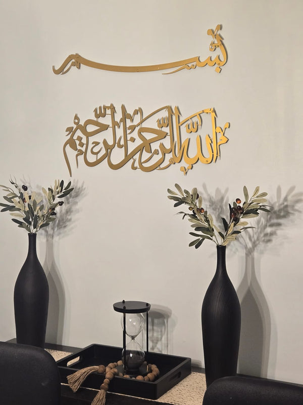 Customer photo of gold Bismillah wall art above black vases