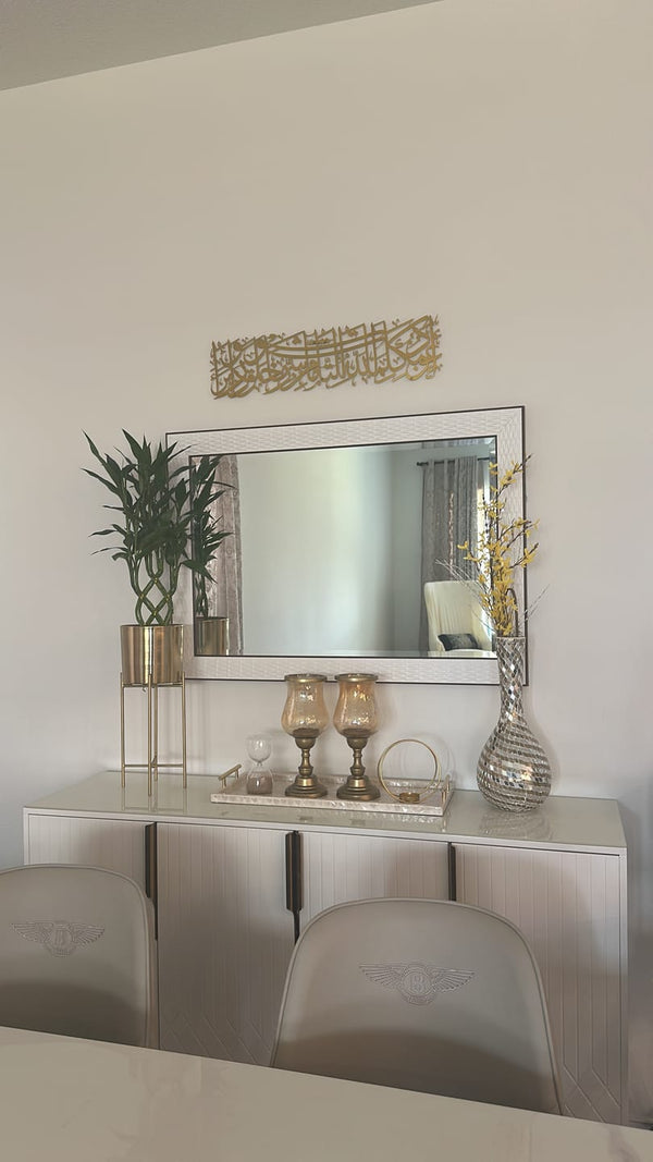 Customer photo of gold Arabic calligraphy above a mirror and console table