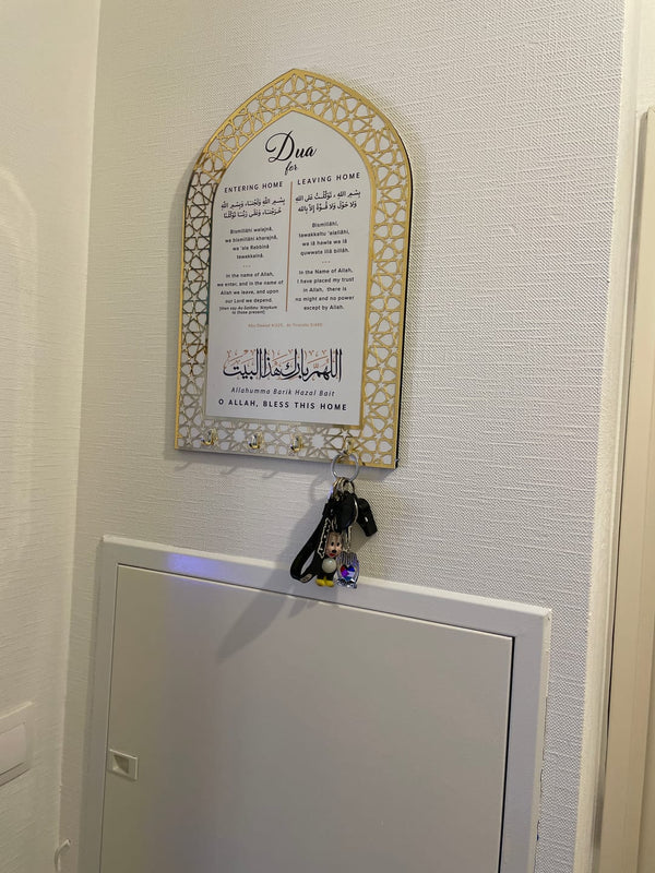 Customer photo of an arched dua key holder with keys by the front door