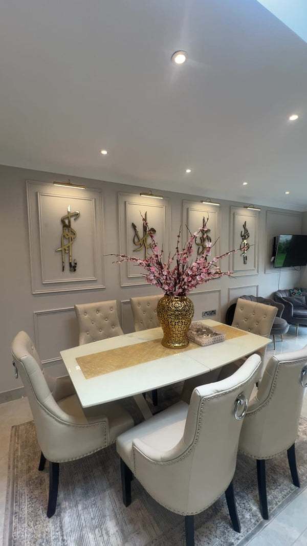 Customer photo of framed calligraphy panels above a white dining table