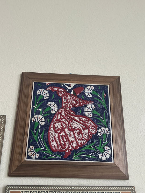 Customer photo of a framed red and blue whirling dervish artwork