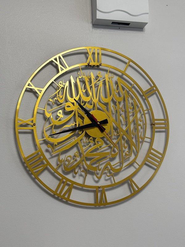 Customer photo of a gold Arabic calligraphy wall clock with Roman numerals