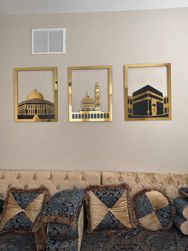 Customer photo of three gold-framed holy mosque wall art pieces above a sofa