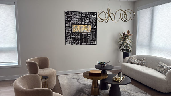 Customer photo of black and gold Kufic calligraphy wall art in a bright living room