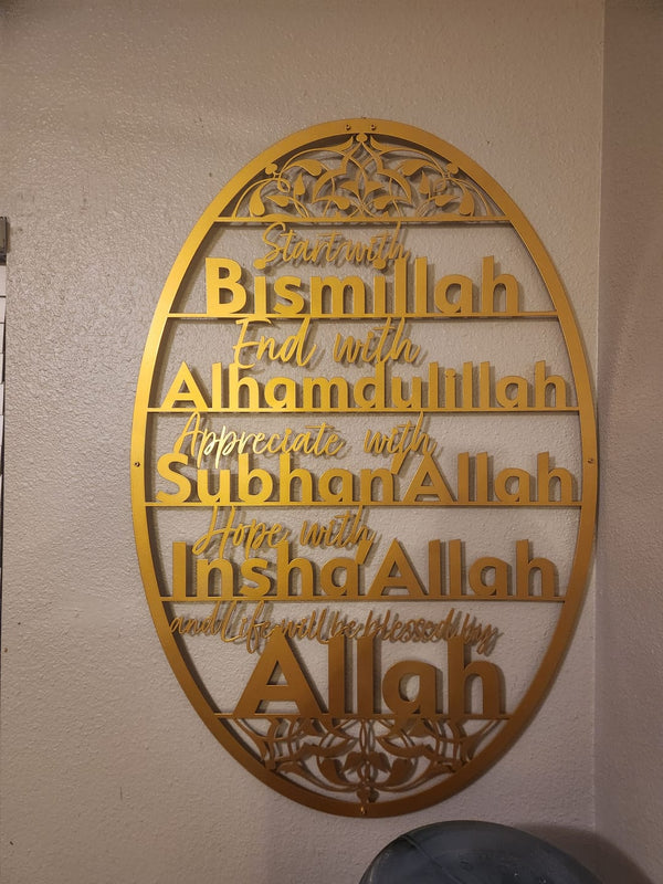 Close-up of oval gold wall art reading start with Bismillah, end with Alhamdulillah