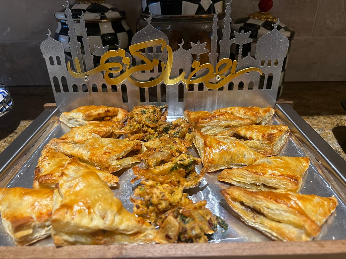 Customer photo of a Ramadan Kareem mosque sign on a tray of pastries