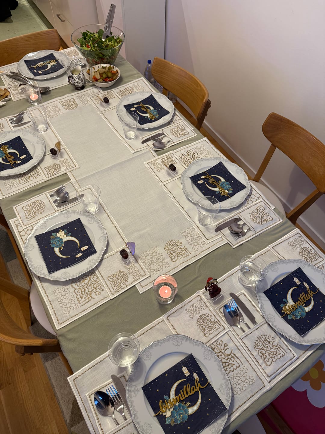 Customer photo of a dining table laid with Ramadan placemats and napkins