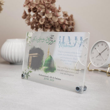 Design 3 Hajj Mabroor acrylic table decor, angled close view showing the clear edge and standoffs