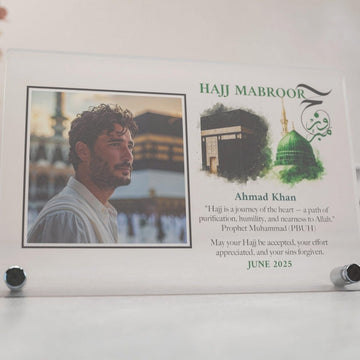 Close-up of Design 1 Hajj Mabroor table decor with photo, Kaaba, green dome and a Hajj quote