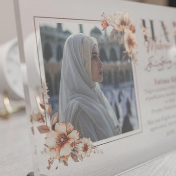 Close-up of the photo in a floral frame on Design 2 Hajj Mabroor table decor