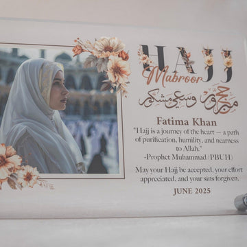 Close view of Design 2 Hajj Mabroor table decor with photo, floral frame and Arabic calligraphy