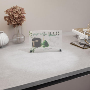 Design 3 Hajj Mabroor table decor on a shelf, far angled view with the green dome and Kaaba artwork